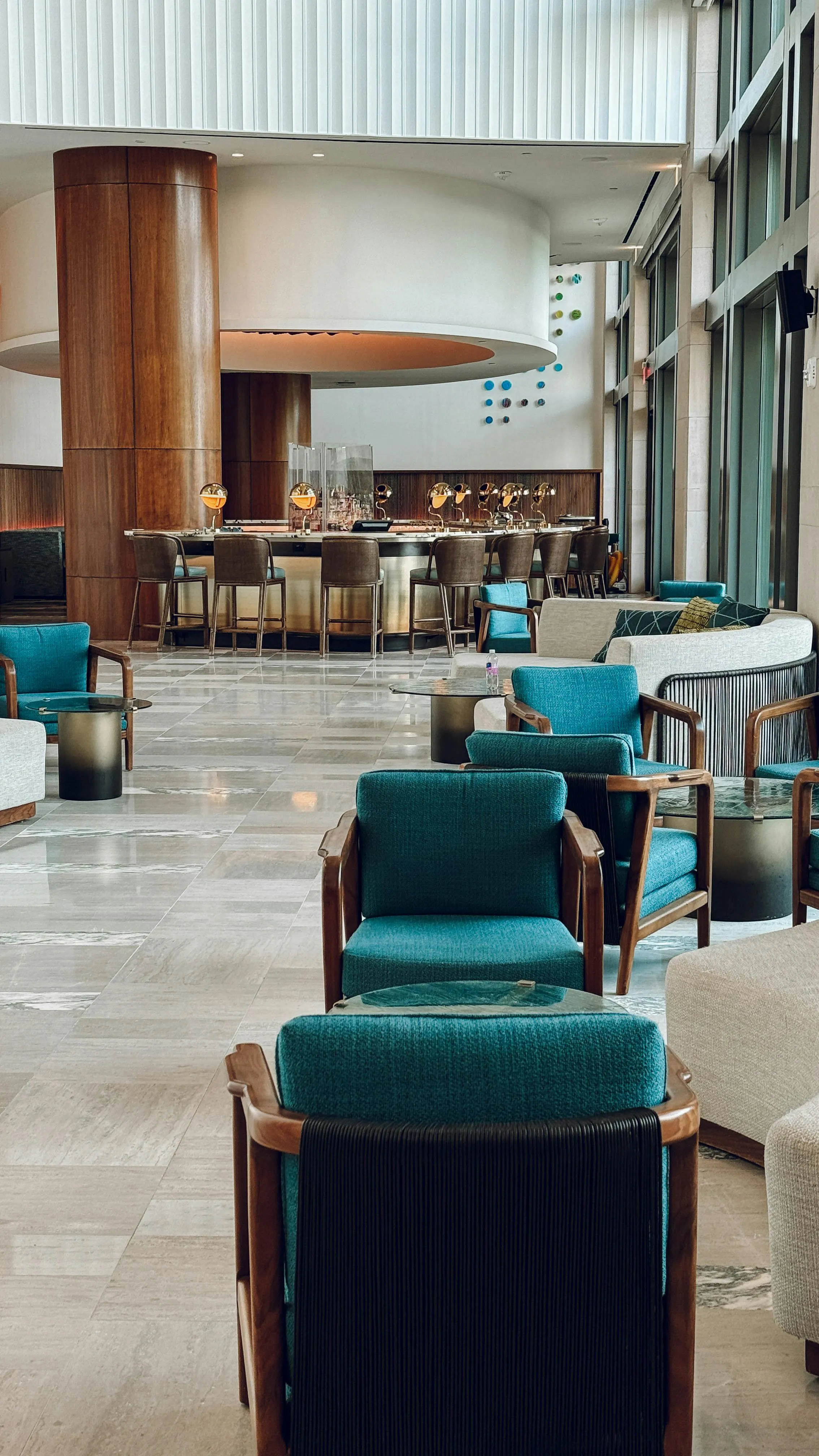 Luxury hotel lobby featuring elegant seating area with modern furniture and sophisticated interior design